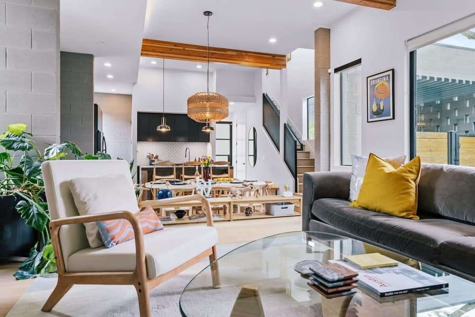 Open living room, dining area and kitchen