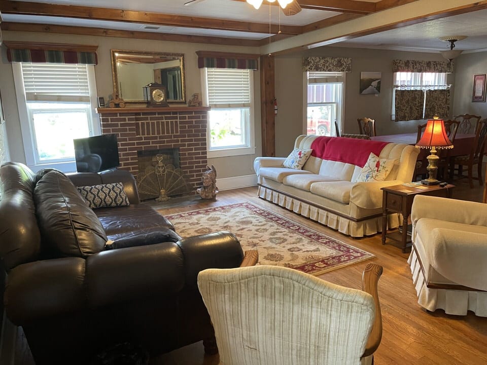 There is plenty of seating in the open living room.