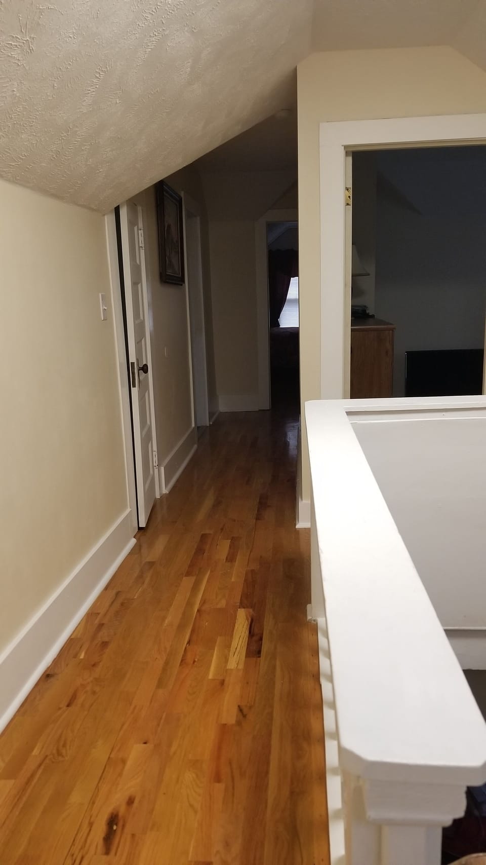 Upstairs hallway to bedroom 3 & 4, bonus room and bathroom.