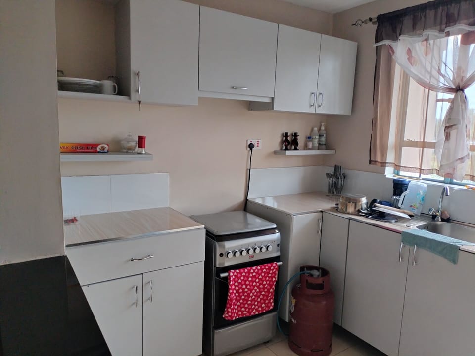 Apartment | Private kitchen | Fridge, microwave, oven, stovetop