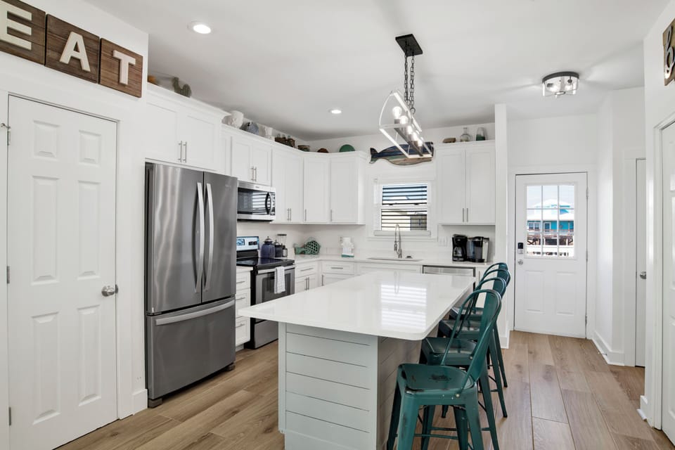 Stainless steel appliances and granite counter tops
