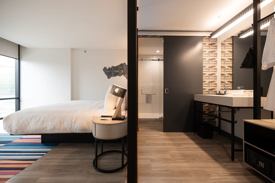 Room, 1 King Bed, City View | Desk, laptop workspace, WiFi (free), individually decorated