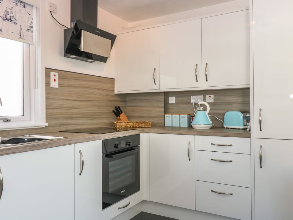 Fridge, dishwasher, electric kettle, toaster