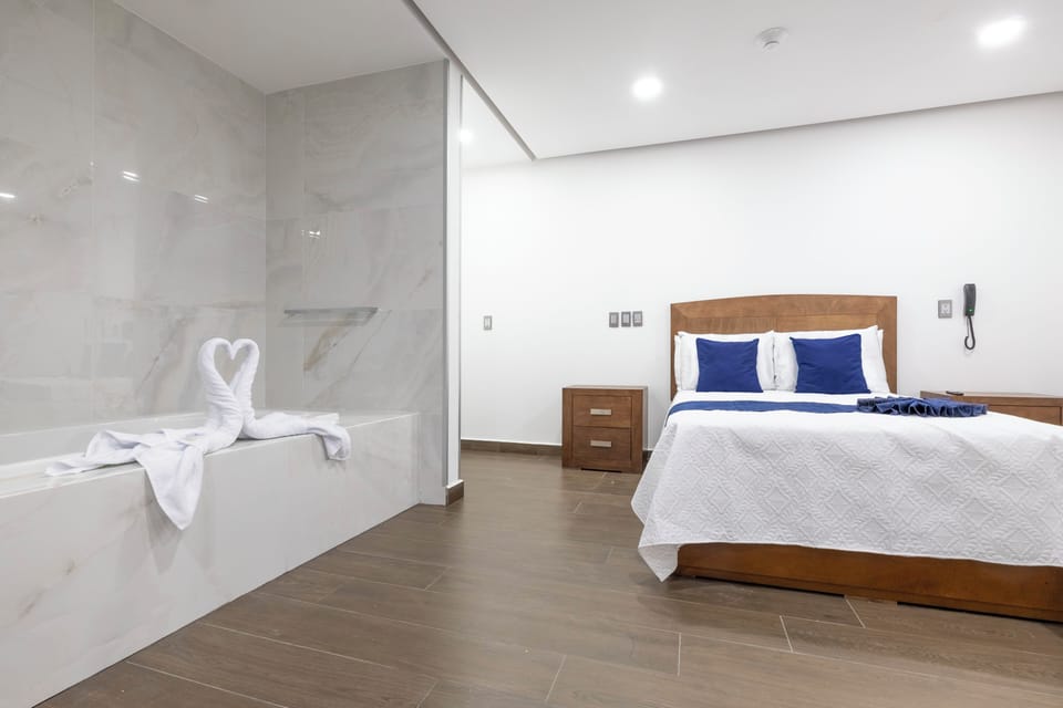 Elite Room | Select Comfort beds, in-room safe, individually decorated, desk