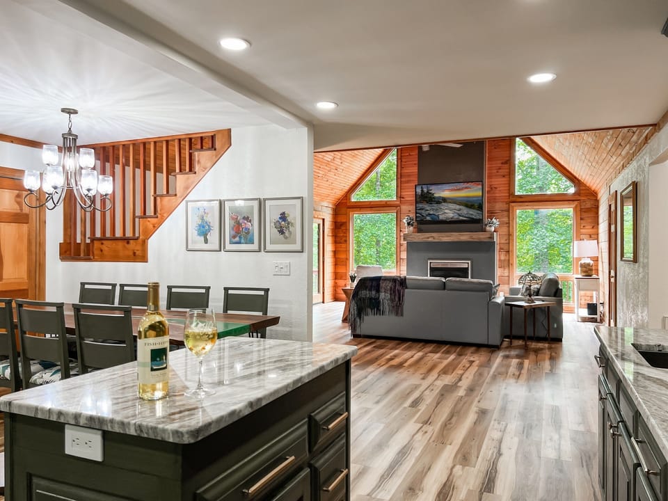 Step into our meticulously remodeled cabin featuring a thoughtfully designed open floor plan.