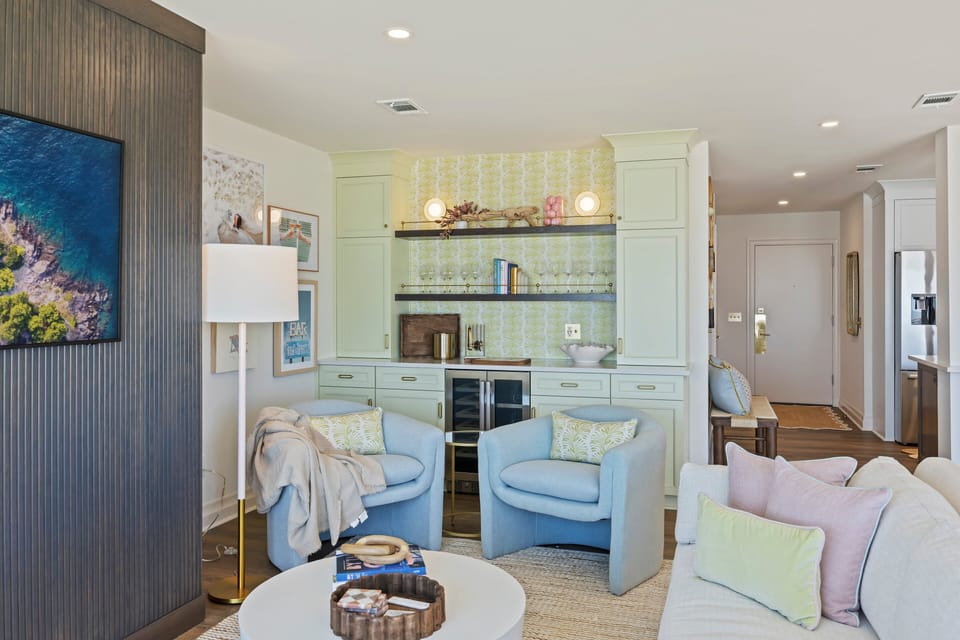 Cozy chairs and dry bar with wine fridge