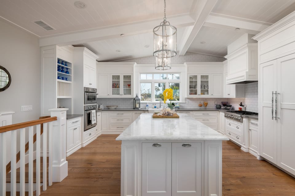 Grab a drink and enjoy watching the cooking show at the huge kitchen island.