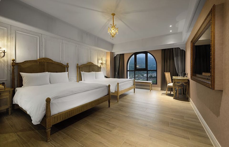 Family Quadruple Room, 2 Double Beds, Non Smoking, Courtyard View | In-room safe, desk, blackout drapes, soundproofing
