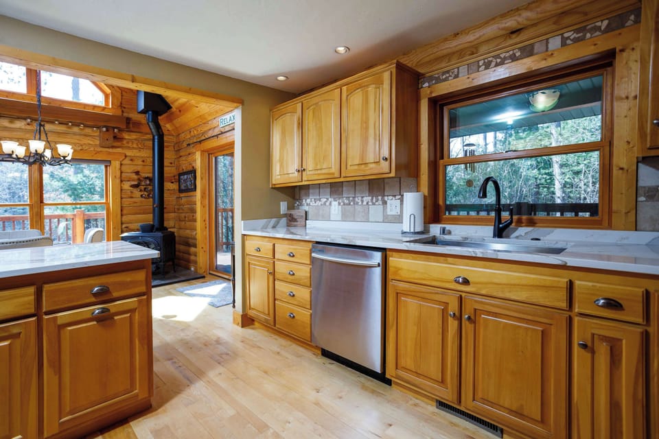 Kitchen includes appliances, utensils, cookware, and more