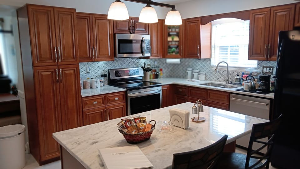 The newly renovated kitchen is the center and heart of the open floor plan.