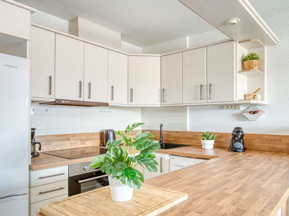 Furniture, Countertop, Kitchen, Kitchen Appliance, Cabinetry, Flooring, Interior Design, Wood, Home Appliance, Major Appliance