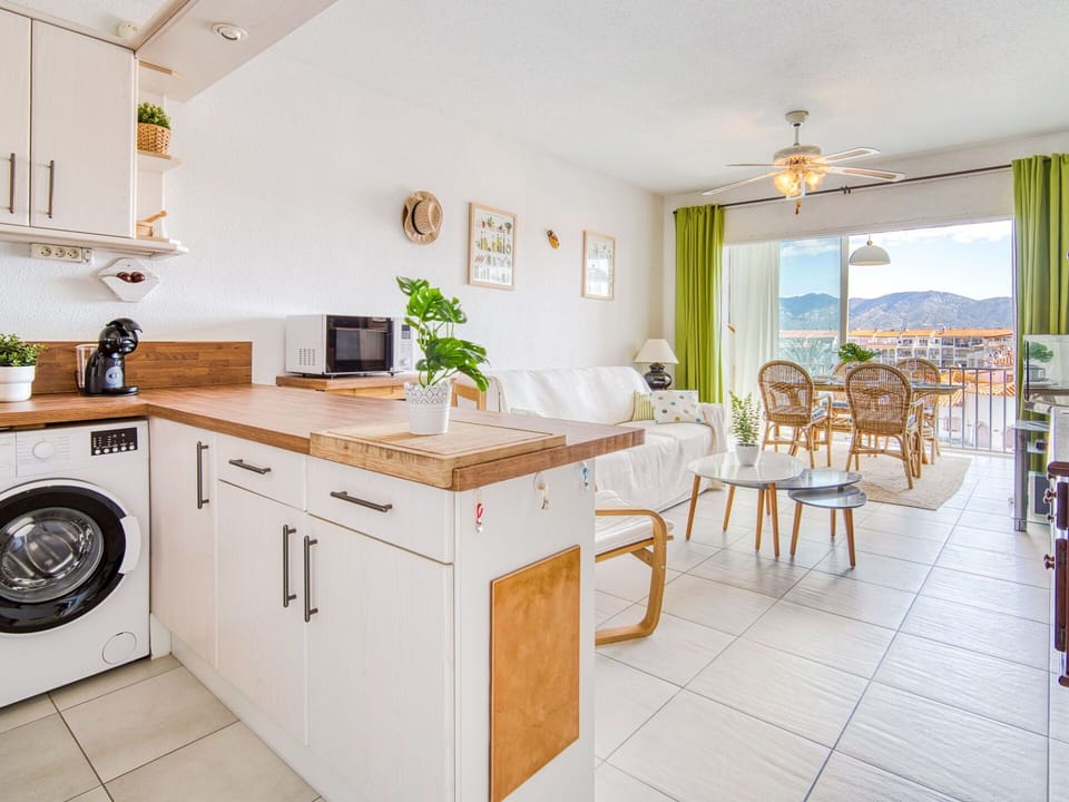 Kitchen, Major Appliance, Furniture, Kitchen Appliance, Interior Design, Countertop, Flooring, Cabinetry, Home Appliance, Home