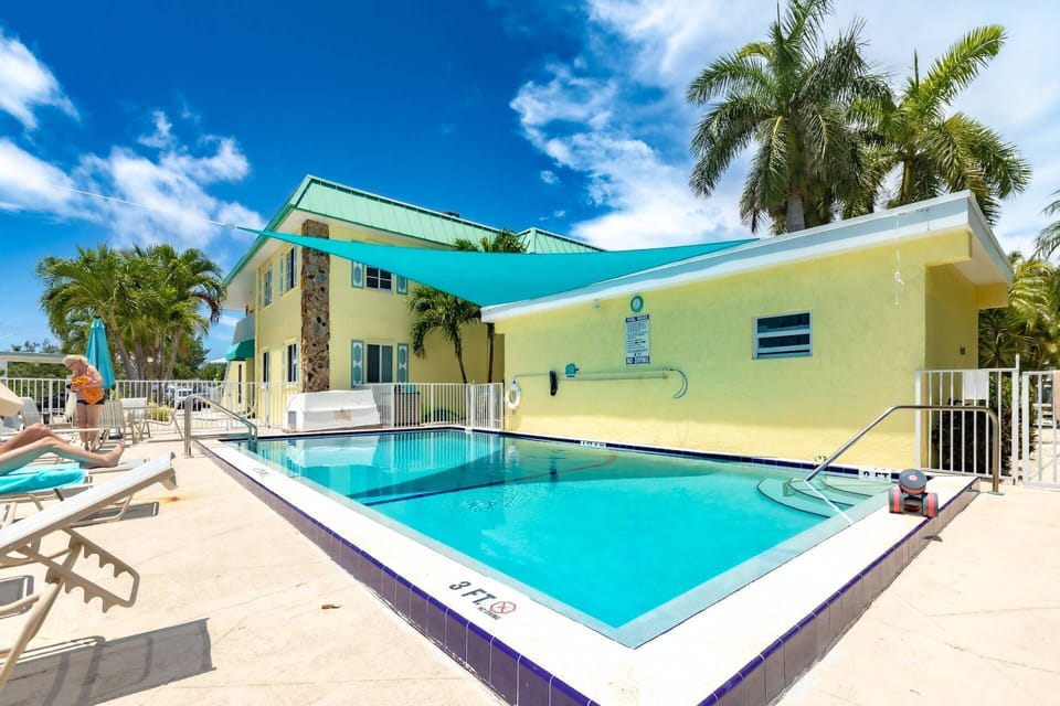 Relax by the inviting shared pool on the property.
