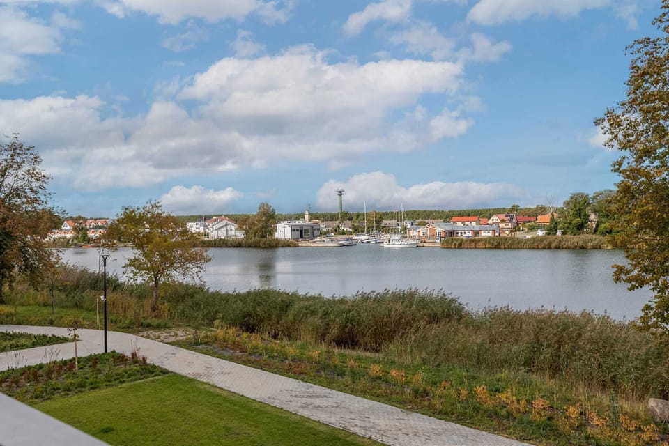 A view of the nearby waterfront, offering tranquil surroundings and a beautiful landscape.