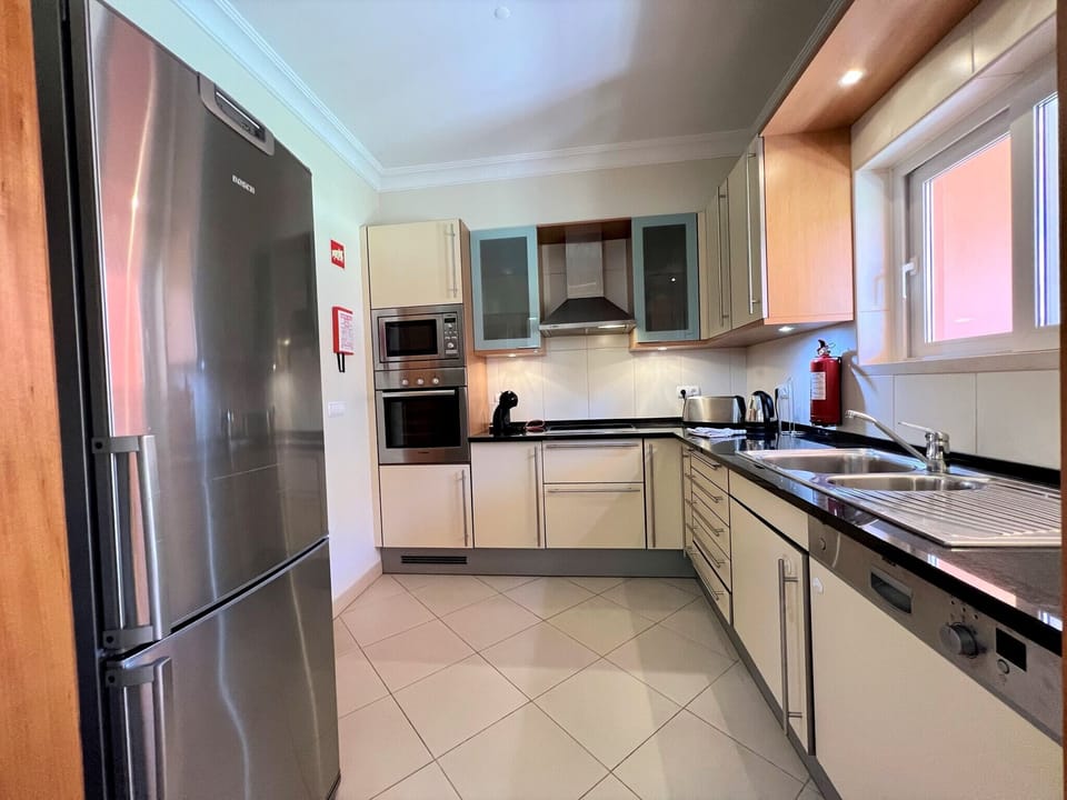 Apartment, 2 Bedrooms, Pool Access | Private kitchen | Coffee/tea maker, microwave, oven, dishwasher