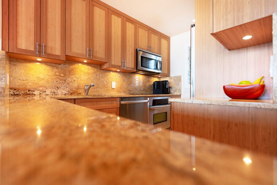 Large granite countertops make preparing a delicious meal easy