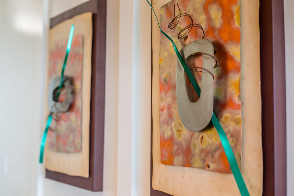 Modern art throughout the condo gives an elegant feel to your stay