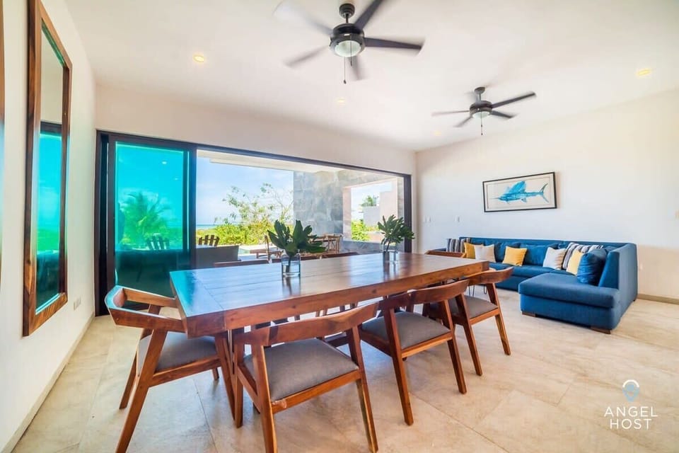 Gather around for memorable meals in this spacious dining area with a view. 