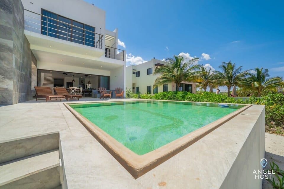 Enjoy a refreshing dip in your private pool or lounge by the water while soaking up the sun. 