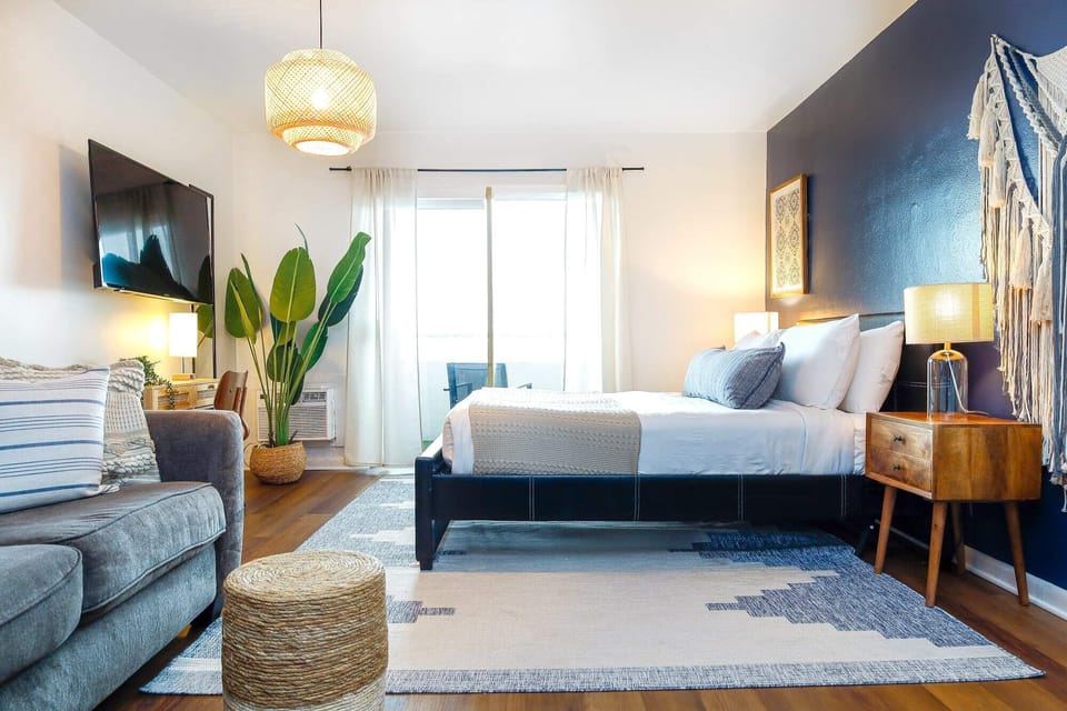 Relax in our stylish living room, a cozy spot that perfectly captures the essence of Miami living.