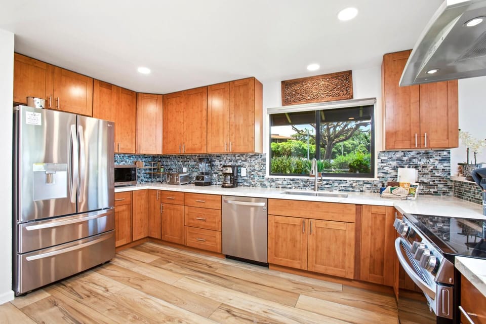     Create, connect, and share in this open-concept kitchen.