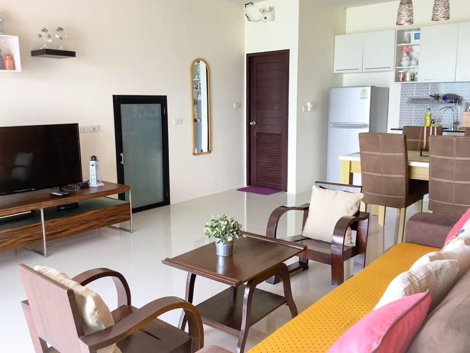 Standard Villa | Living area | 60-inch LED TV with digital channels, TV, Netflix