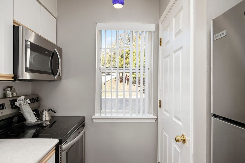 Laundry - across from range, and next to fridge.