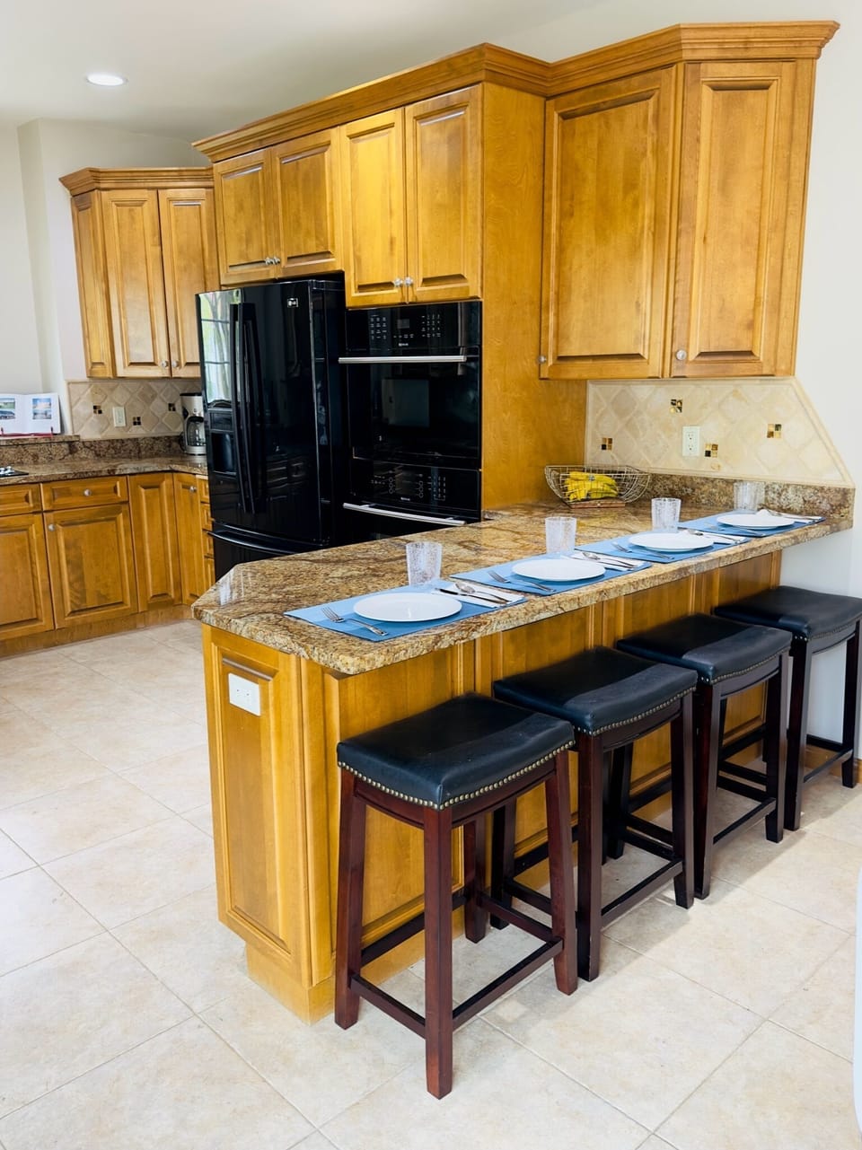 Kitchen with dining area and 4 barstools
