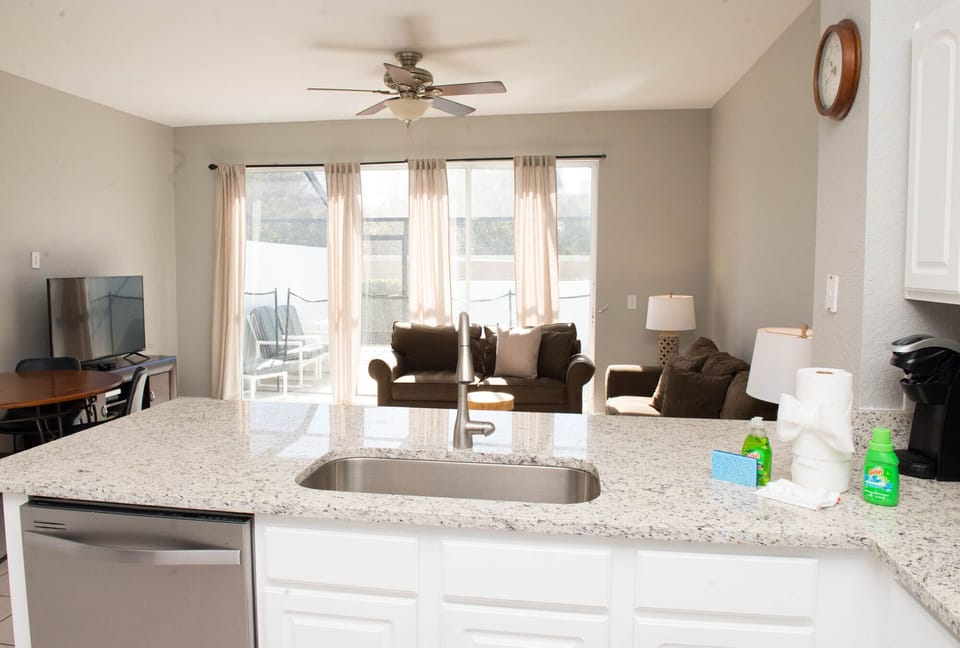 Comfortable living room with walkout to private splash pool