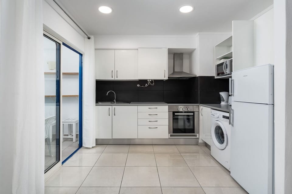 An elegant kitchennette, equipped with all the essentials you might need during your stay. #practical #clean #algarve #home #cooking