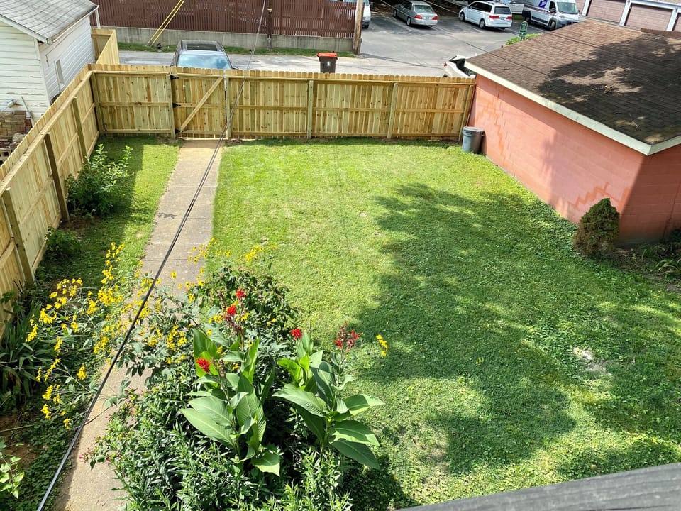 Enclosed back yard. Close free, private parking on other side of the gate