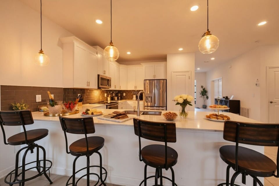 Bright chef’s kitchen with oversized island