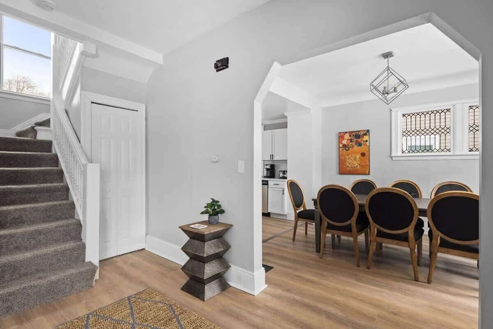 Open layout connecting dining space and entryway.