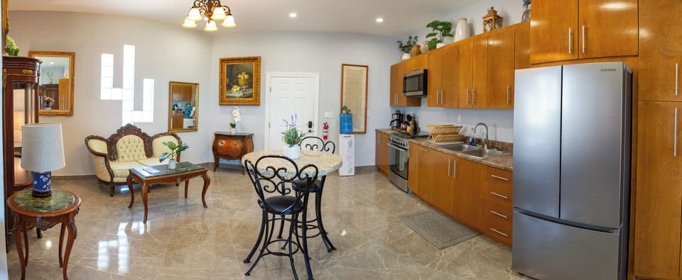 Romantic Suite | Private kitchen | Full-size fridge, microwave, oven, stovetop
