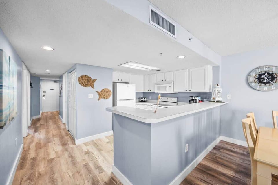 Cook, dine, and unwind in a clean, open-concept kitchen made for guests.

