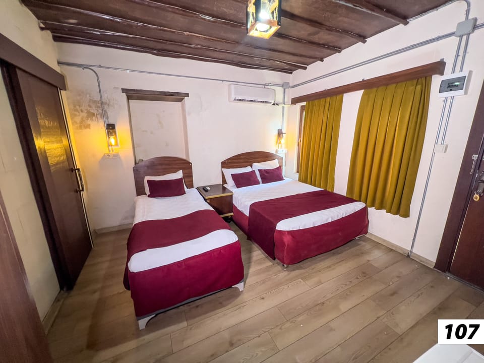 Family Twin Room | Minibar, free WiFi