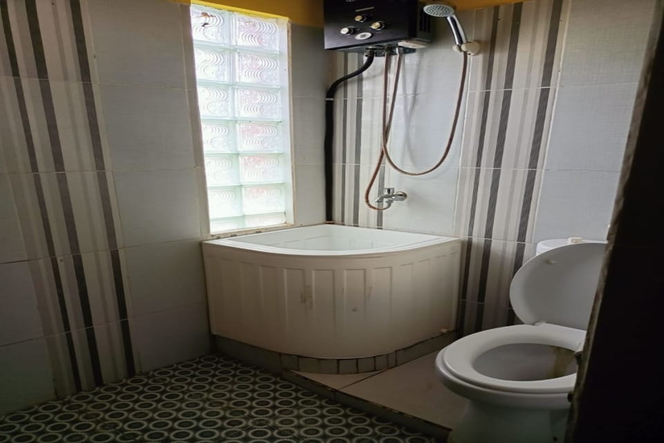 Family Room | Bathroom | Shower, rainfall showerhead, towels, toilet paper