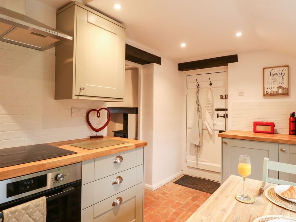 Fridge, electric kettle, toaster, cookware/dishes/utensils
