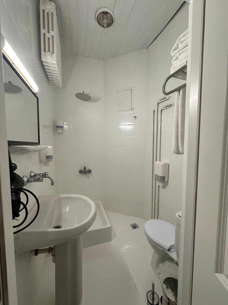 Rainfall showerhead, hair dryer, slippers, heated floors