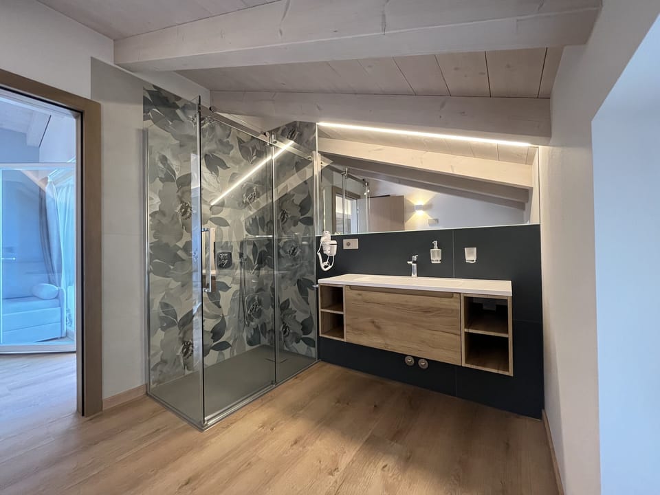 Junior Quadruple Room, Multiple Beds, Terrace, Mountain View | Bathroom | Separate tub and shower, jetted tub, rainfall showerhead