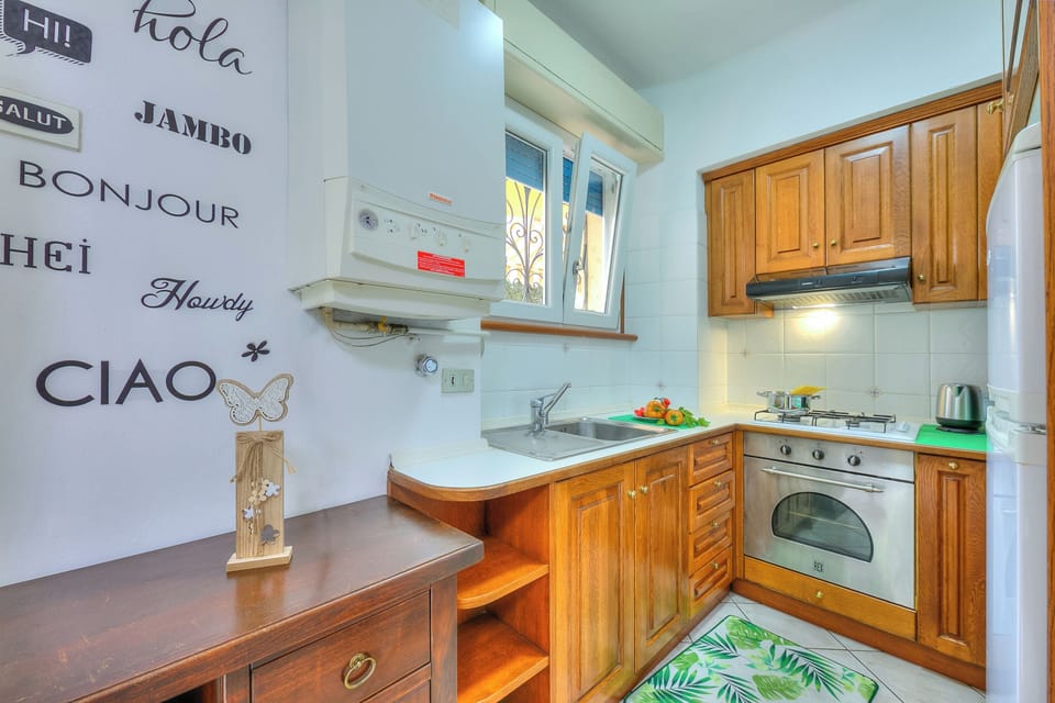 Family Apartment, 2 Bedrooms, Microwave (Leonardo House Garden Stresa Center) | Private kitchen | Espresso maker