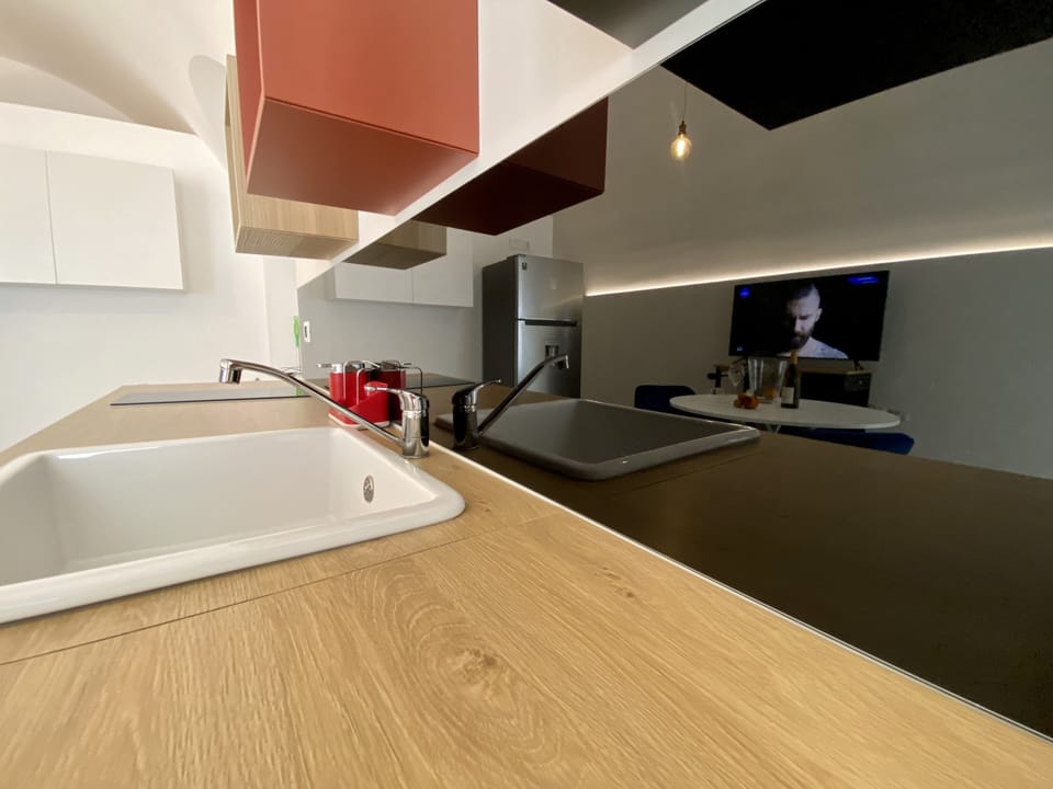 Apartment | Private kitchen | Stovetop, espresso maker, cleaning supplies, freezer