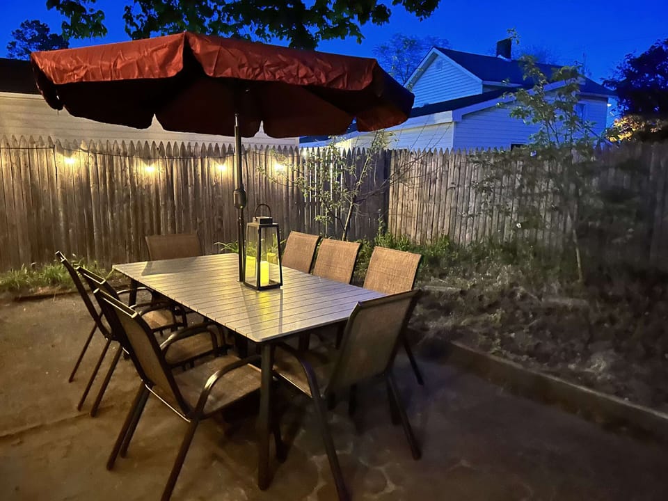 Back patio area with dining table for 8

