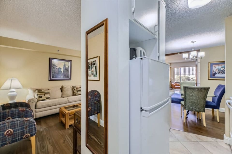 Step into modern elegance with our newly renovated home featuring stunning wood-like flooring.
