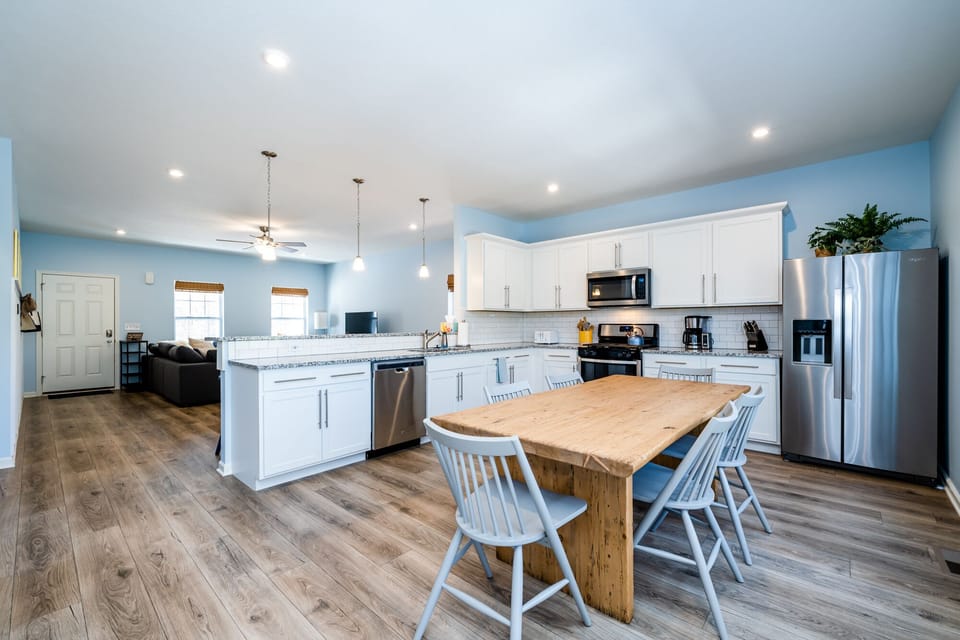 The open concept full kitchen is ready for cooking anything from frozen nuggets to a three course dinner