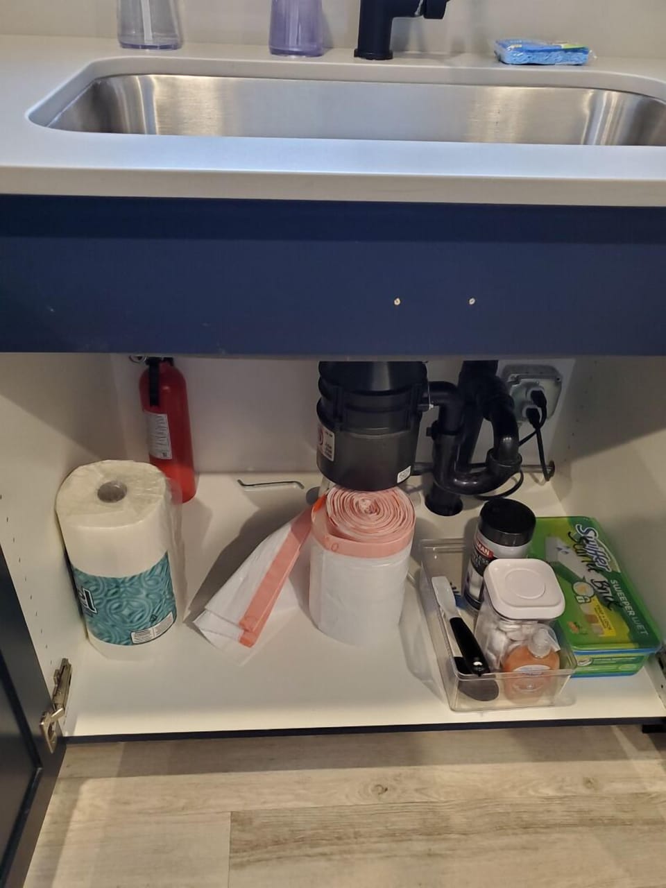 Extra paper towels and garbage bags