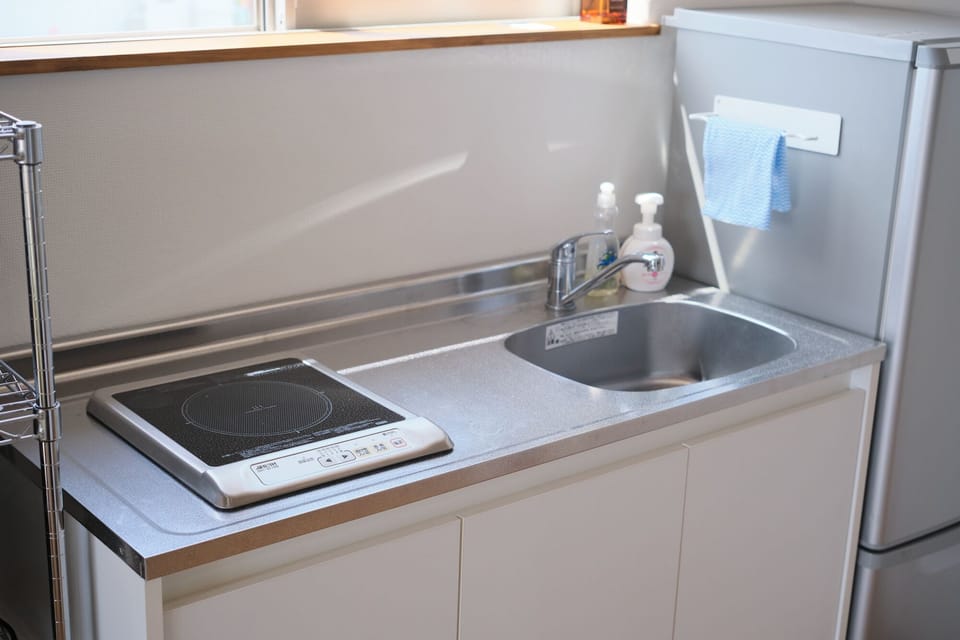 Comfort Villa | Private kitchen | Full-size fridge, microwave, stovetop, electric kettle