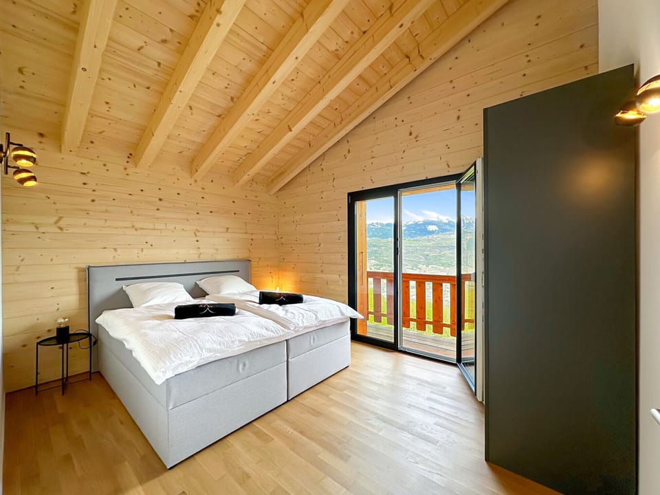 A large, spacious room with a king-size bed to ensure your comfort.