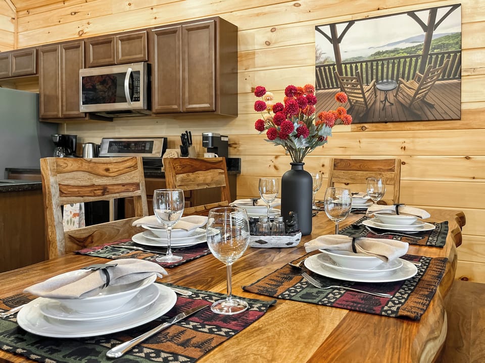 The live-edge wooden dining table is a true focal piece within the space. 