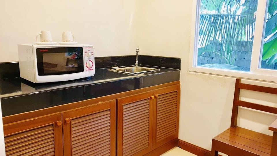 Standard Room | Private kitchen | Fridge, coffee/tea maker, electric kettle